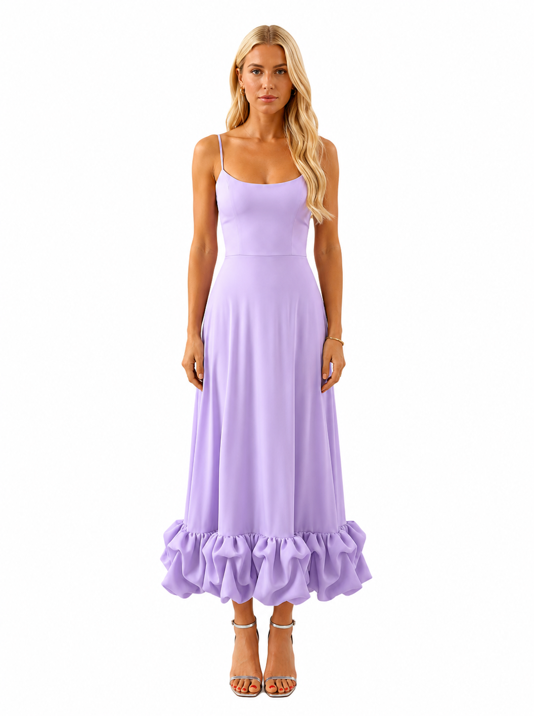 A woman modeling a lavender purple maxi dress with spaghetti straps, a fitted bodice, and a ruffled hem, shown against a plain white background.