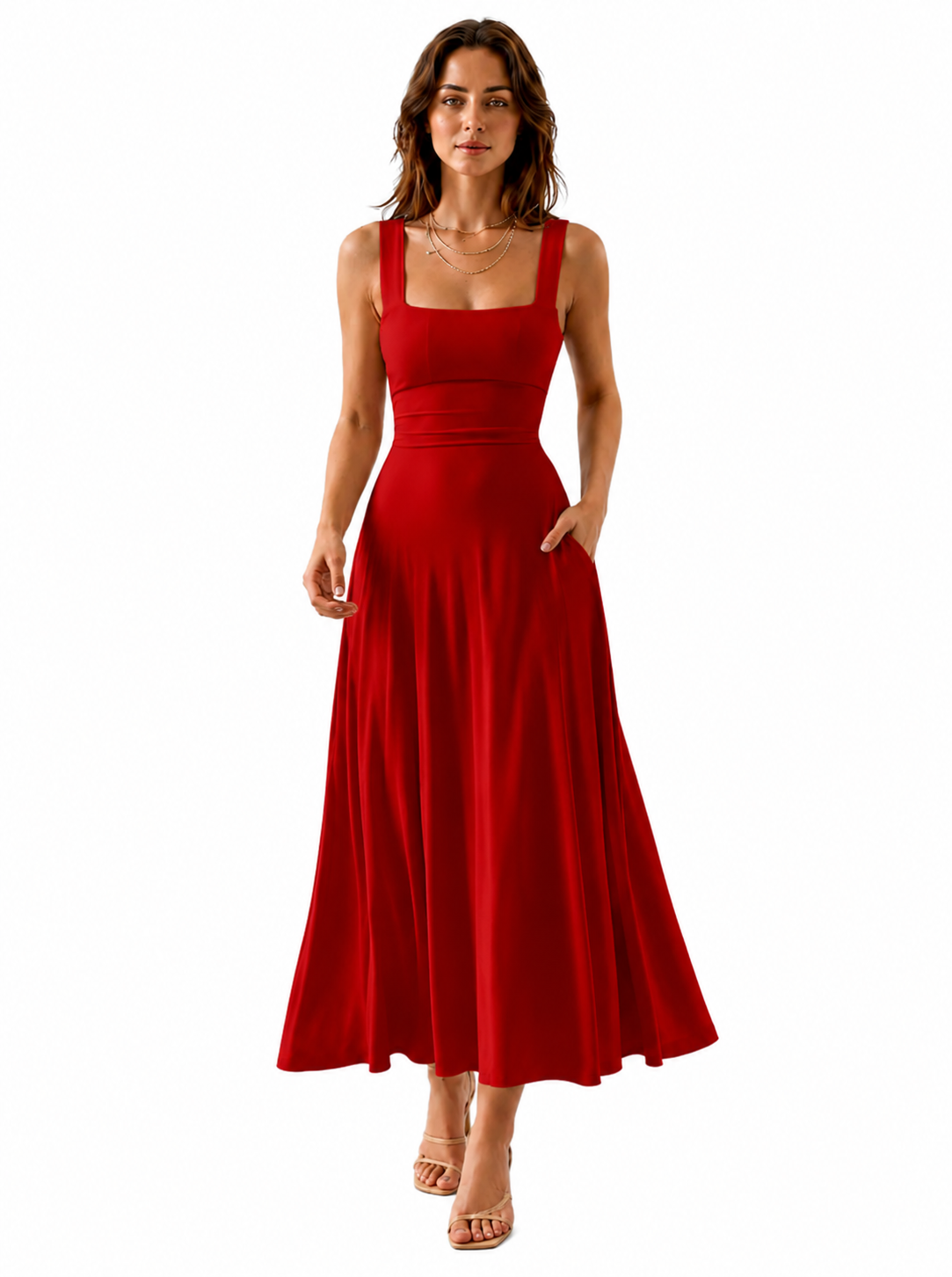 A woman modeling a red sleeveless maxi dress with a square neckline, wide shoulder straps, a fitted bodice, and a flowing skirt with side pockets, shown against a plain white background.